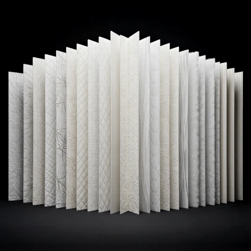 A sophisticated architectural arrangement of diverse white material swatches and fabric samples on a stark black background to emphasize tonal variety and shadow.